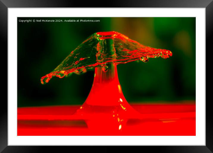 An umbrella of water Framed Mounted Print by Neil McKenzie