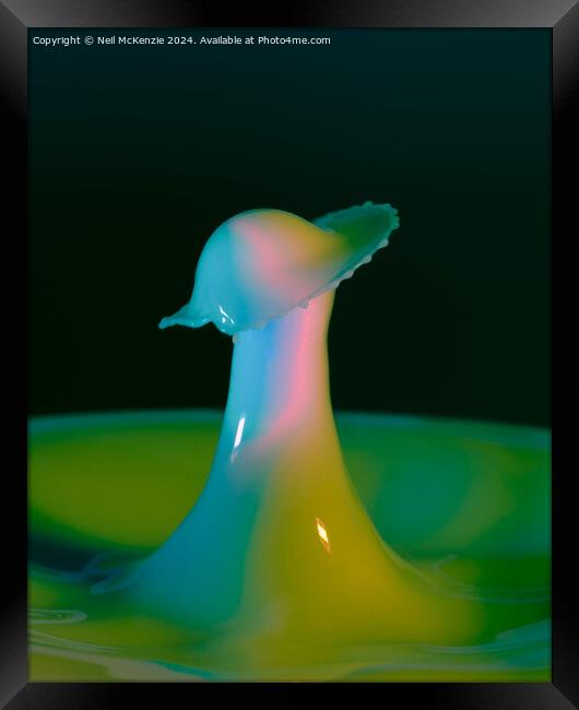 Splash Tower of Milk  Framed Print by Neil McKenzie