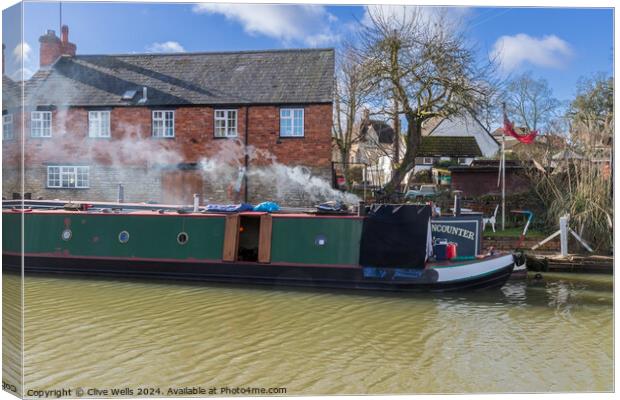 Smoke from a narrow boat Canvas Print by Clive Wells