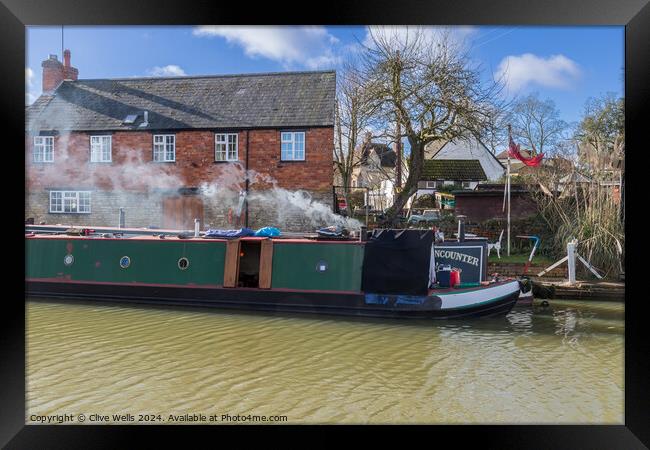 Smoke from a narrow boat Framed Print by Clive Wells