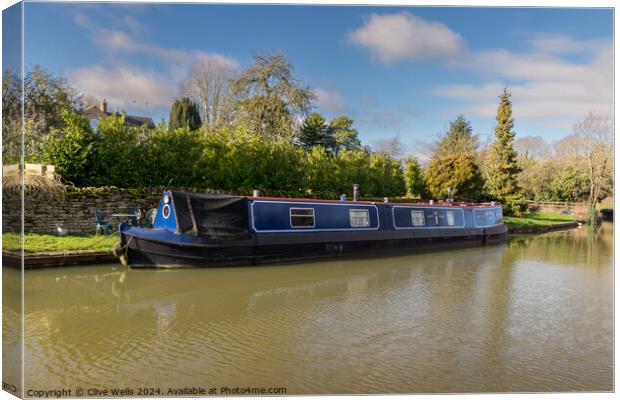 Moored narrow boat Canvas Print by Clive Wells