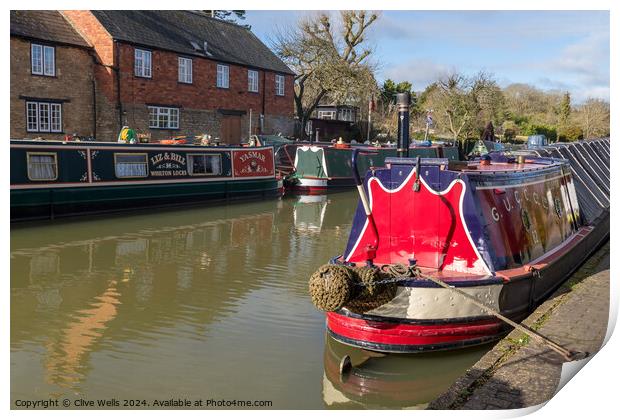 Narrow boats at rest Print by Clive Wells