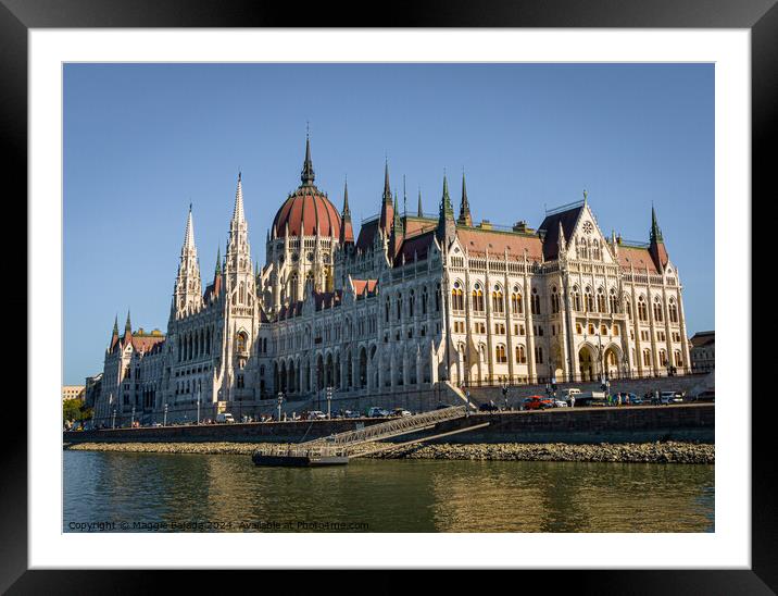 Colorful buildings of Hungarian Parliament in Budapest.  Framed Mounted Print by Maggie Bajada