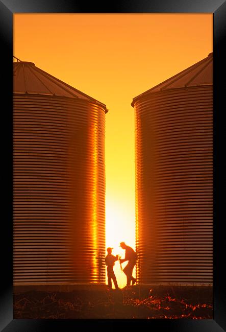 Father and Son Farmers Framed Print by Dave Reede