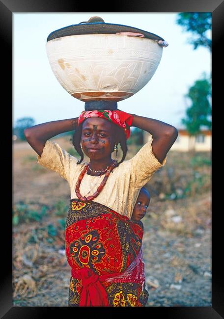 Fulani Woman With Child Framed Print by Dave Reede