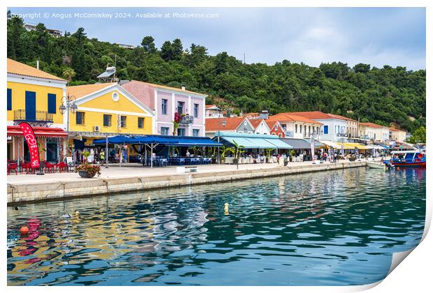 Colourful waterfront buildings at Katakolon Greece Print by Angus McComiskey
