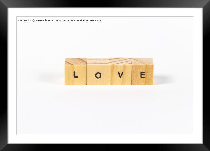 Love written with wooden cubes Framed Mounted Print by aurélie le moigne