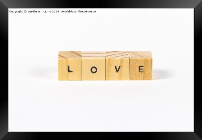 Love written with wooden cubes Framed Print by aurélie le moigne