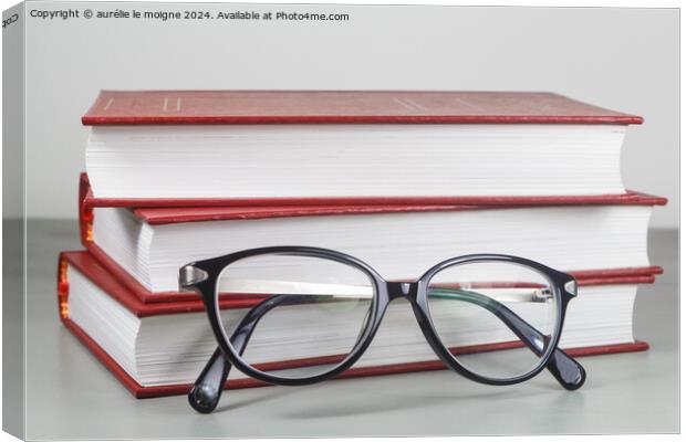 Heap of red books and glasses Canvas Print by aurélie le moigne