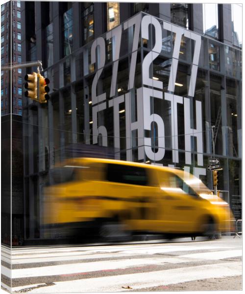 Taxi cab on 5th Avenue, New York  Canvas Print by Peter Towle