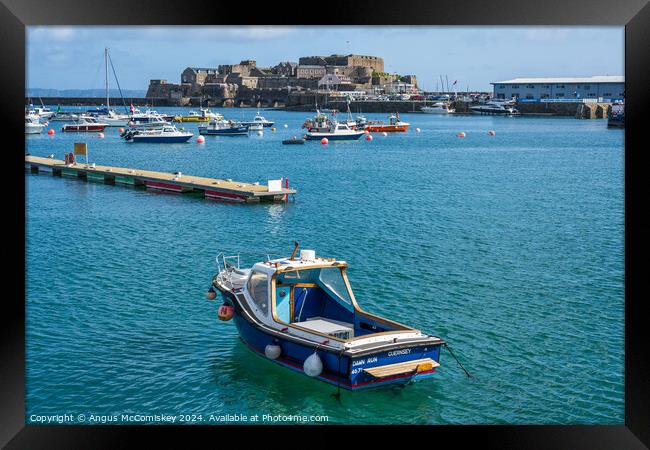 Castle Cornet from St Peter Port harbour, Guernsey Framed Print by Angus McComiskey