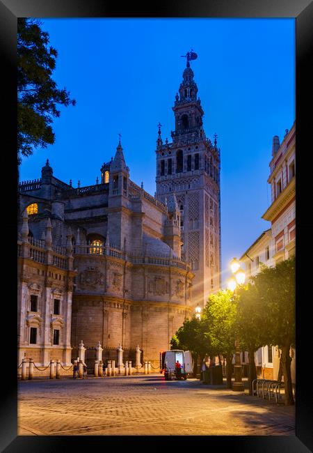 Seville Cathedral And Giralda Tower At Night Framed Print by Artur Bogacki