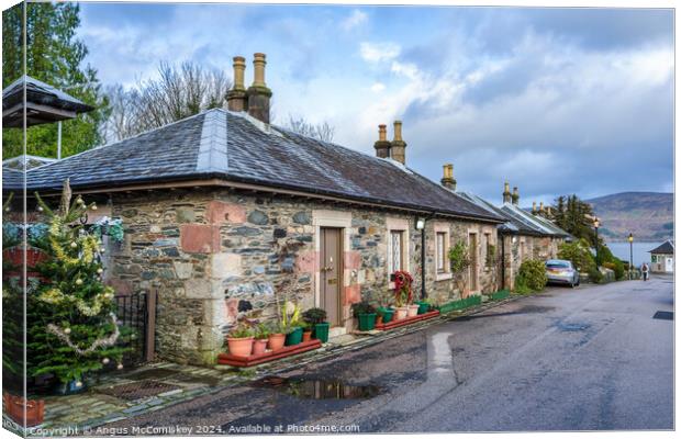 Cottages on Pier Road in Luss, Scotland Canvas Print by Angus McComiskey