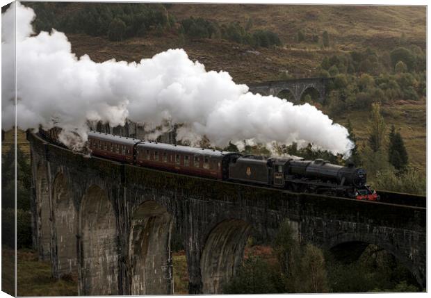 The Jacobite Crossing Glenfinnan Viaduct Canvas Print by Anthony McGeever