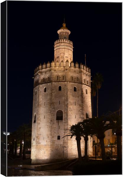 Tower Of Gold At Night In Seville Canvas Print by Artur Bogacki
