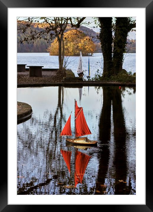 Model boat pond at Windermere, Cumbria. Framed Mounted Print by Phil Brown