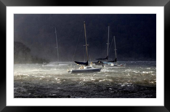 Storms on Windermere for moored yachts. Framed Mounted Print by Phil Brown