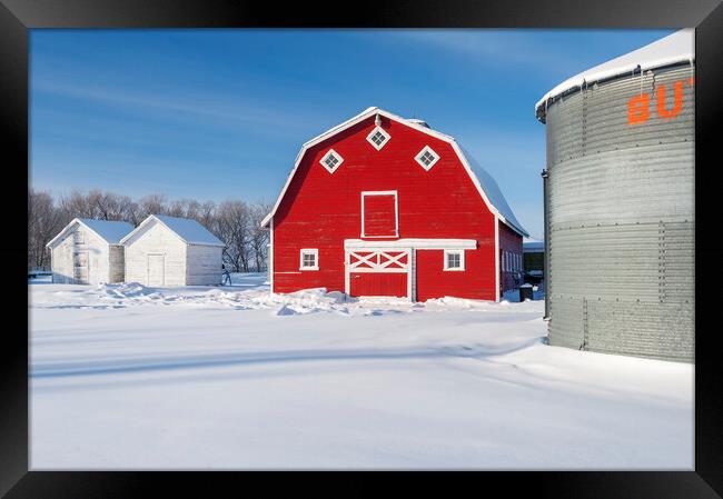Old Grain Bin and Red Barn in Winter Framed Print by Dave Reede