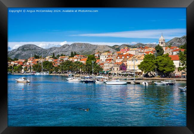 Boats moored in Cavtat harbour in Croatia Framed Print by Angus McComiskey