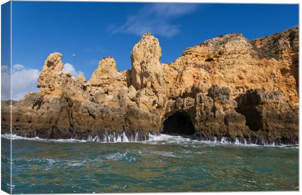 Algarve Coastline With Cave From The Atlantic Ocean Canvas Print by Artur Bogacki