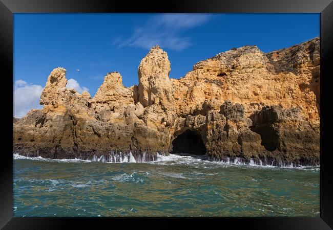 Algarve Coastline With Cave From The Atlantic Ocean Framed Print by Artur Bogacki