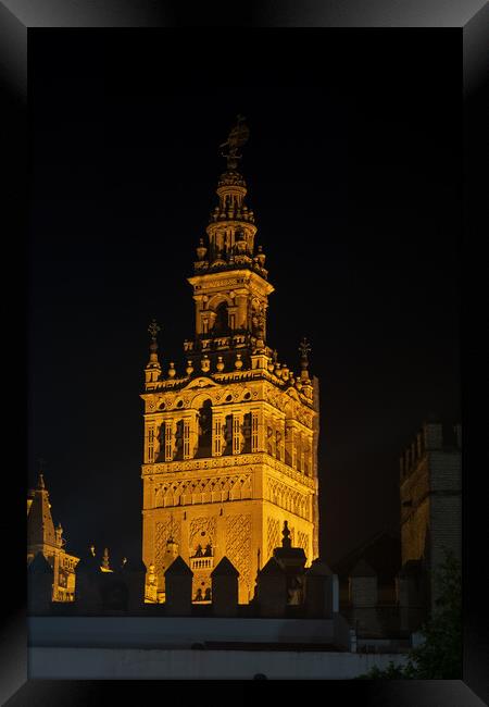 Giralda Bell Tower Of Seville Cathedral At Night Framed Print by Artur Bogacki
