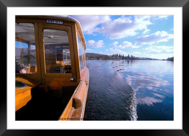 Wooden boat cruising on Windermere, Lake Distict. Framed Mounted Print by Phil Brown