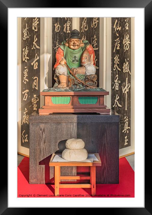 Wooden statue of Ebisu above a kagami-mochi rice cake. Framed Mounted Print by  Kuremo