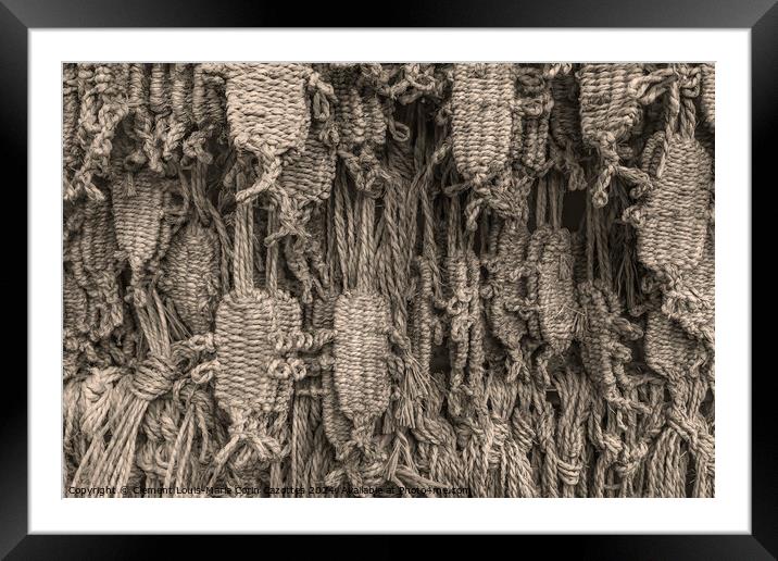 Buddhist straw sandals on an offering wall. Framed Mounted Print by  Kuremo