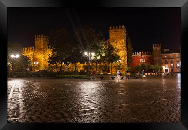 Royal Alcazar and Plaza del Triunfo In Seville Framed Print by Artur Bogacki