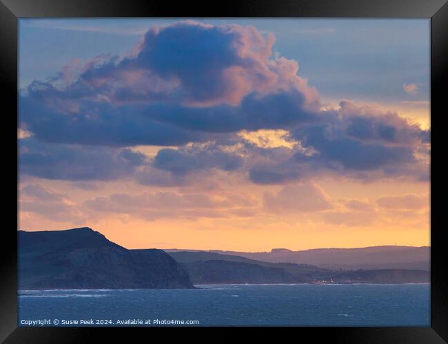 Fiery Storm Clouds at Sunrise over the Jurassic Coast Framed Print by Susie Peek