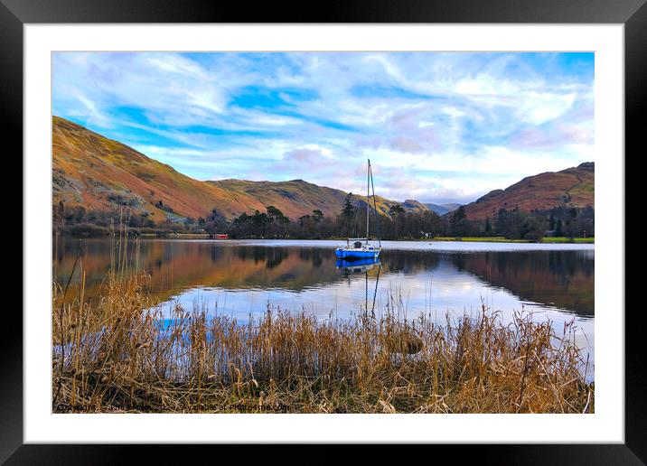 A yacht moored on Ullswater, Lake District, Cumbria. Framed Mounted Print by Phil Brown