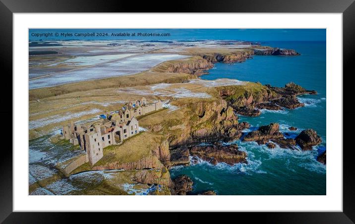 Slains Castle under a light dusting of snow Framed Mounted Print by Myles Campbell