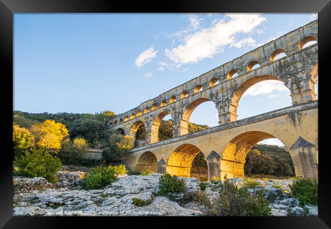 Famous Pont du Gard, at setting sun. Photography taken in Proven Framed Print by Laurent Renault
