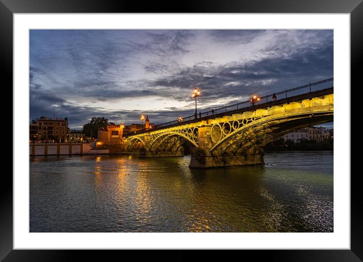 Evening at Triana Bridge in Seville Framed Mounted Print by Artur Bogacki