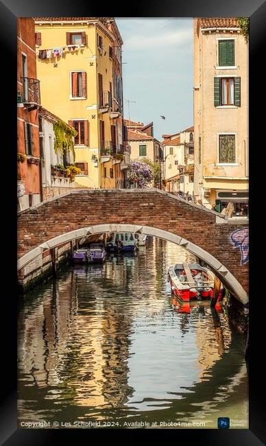 The back canals of Venice  Framed Print by Les Schofield