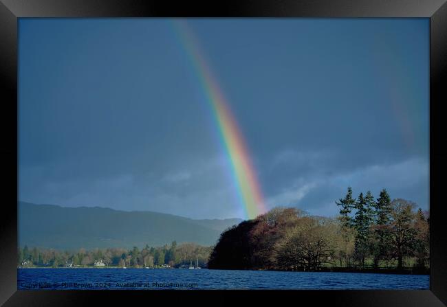 Dramatic rainbow on Windermere. Framed Print by Phil Brown