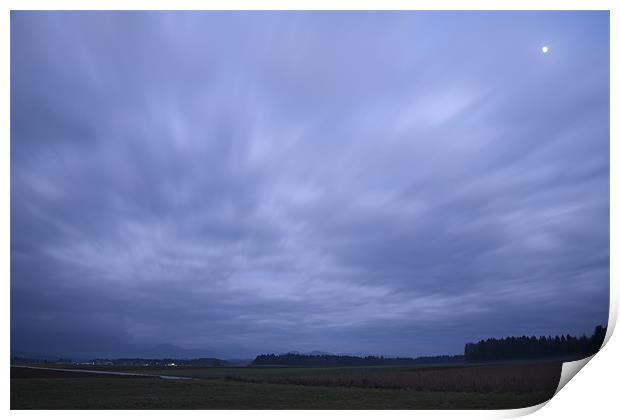 Storm clouds at dusk Print by Ian Middleton