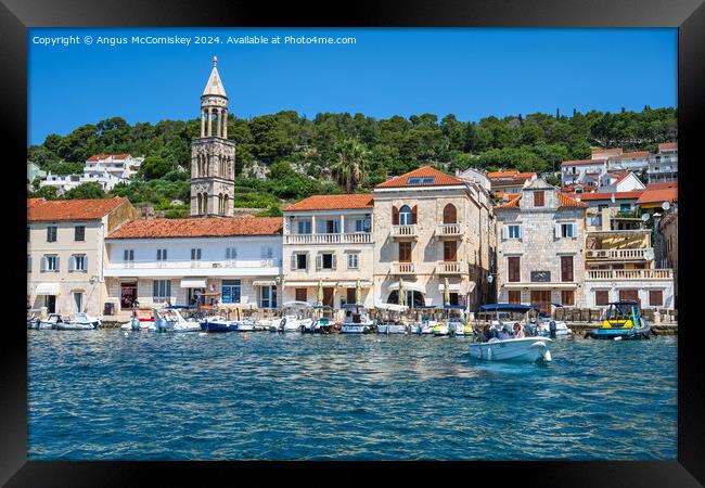 Boats on waterfront of Hvar town, Croatia Framed Print by Angus McComiskey