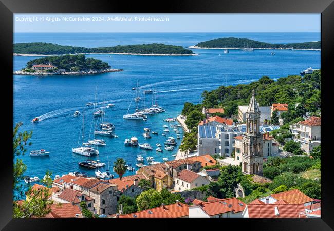 Aerial view of Hvar town and harbour, Croatia Framed Print by Angus McComiskey