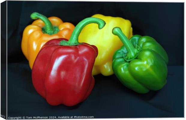 Peppers Canvas Print by Tom McPherson