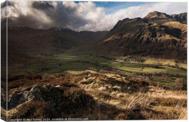 Evening storm approaches over Langdale mountains a Canvas Print by Paul Edney