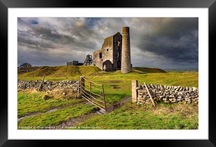 Magpie Mine under storm clouds Framed Mounted Print by Chris Drabble