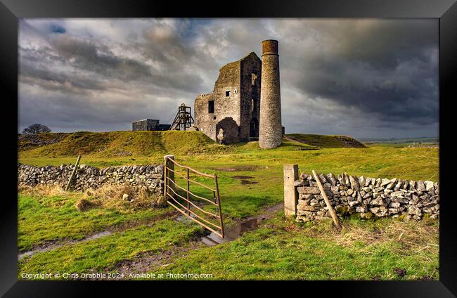 Magpie Mine under storm clouds Framed Print by Chris Drabble