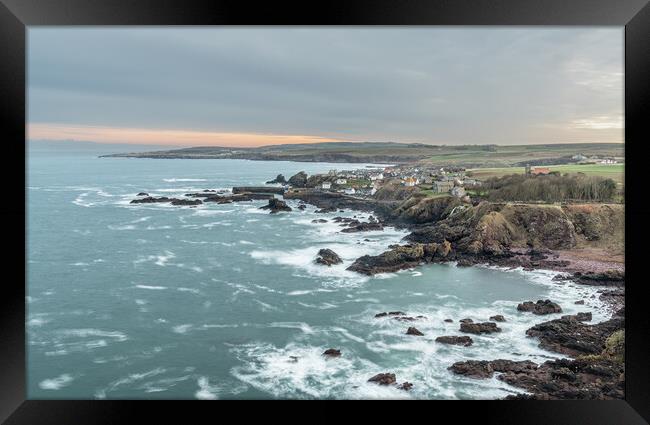 Long exposure of the sea, rocky coastline, Town and Harbour, St Abbs, Scotland Framed Print by Dave Collins