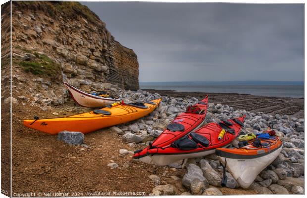 Kayaks at Nash Point Canvas Print by Neil Holman