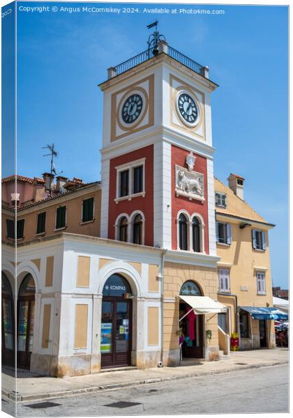Clock Tower in old town of Rovinj, Croatia Canvas Print by Angus McComiskey