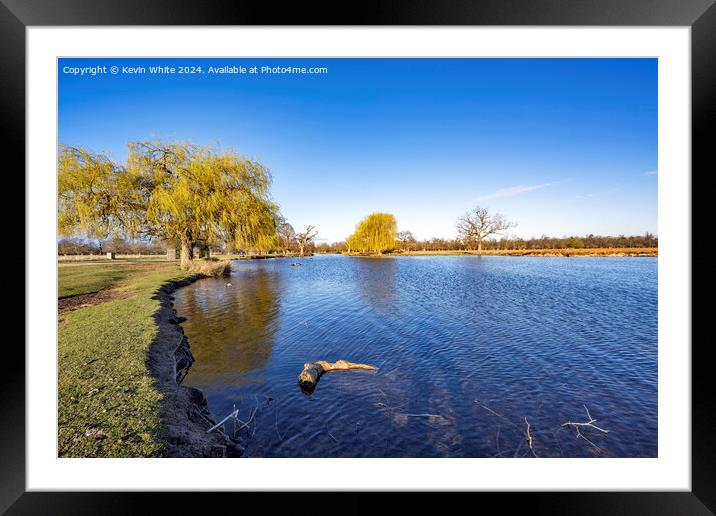 Pure blue sky and pure clear water Framed Mounted Print by Kevin White