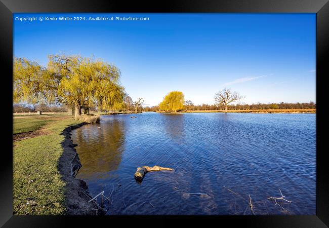 Pure blue sky and pure clear water Framed Print by Kevin White