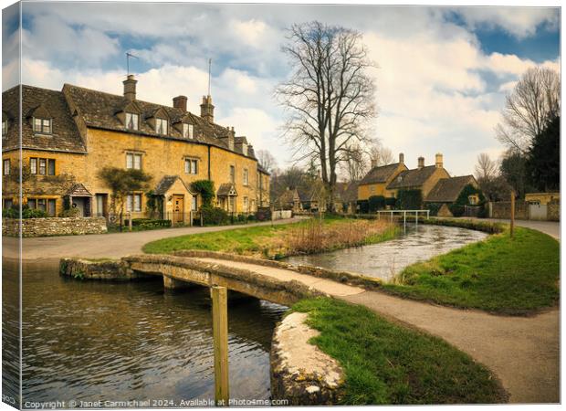 Lower Slaughter in the Cotswolds Canvas Print by Janet Carmichael